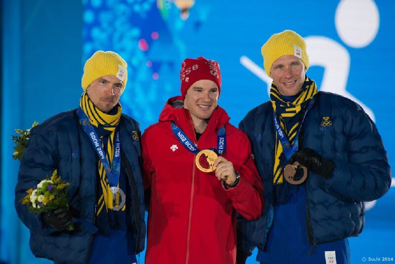 Sotchi 2014: Skilanglauf 15 km klassisch der Männer Siegerehrung - Johan Olsson (SWE), Dario Cologna (SUI), Daniel Richardsson (SWE) - Foto: Sochi 2014 Olympic Winter Games