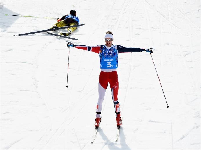 Sotchi 2014: Nordische Kombination Teamwettbewerb Zieleinlauf - Jörgen Graabak (NOR) vor Fabian Rießle (GER) - Foto: Sochi 2014 Olympic Winter Games