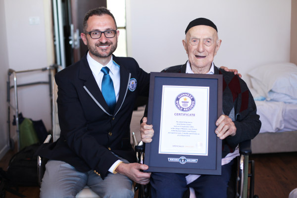 NEW WORLD'S OLDEST MAN ANNOUNCED BY GUINNESS WORLD RECORDS Marco Frigatti, Head of Records for Guinness World Records, presents Israel Kristal his certificate of achievement for Oldest living man on 11th March 2016, Haifa, Israel. Copyright: ©GUINNESS WORLD RECORDS